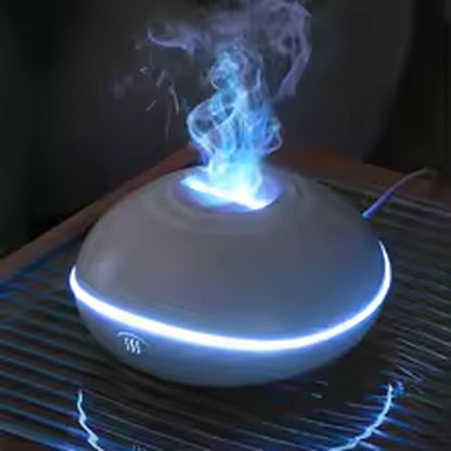 Diffuseur blanc en ambiance bleue sur table