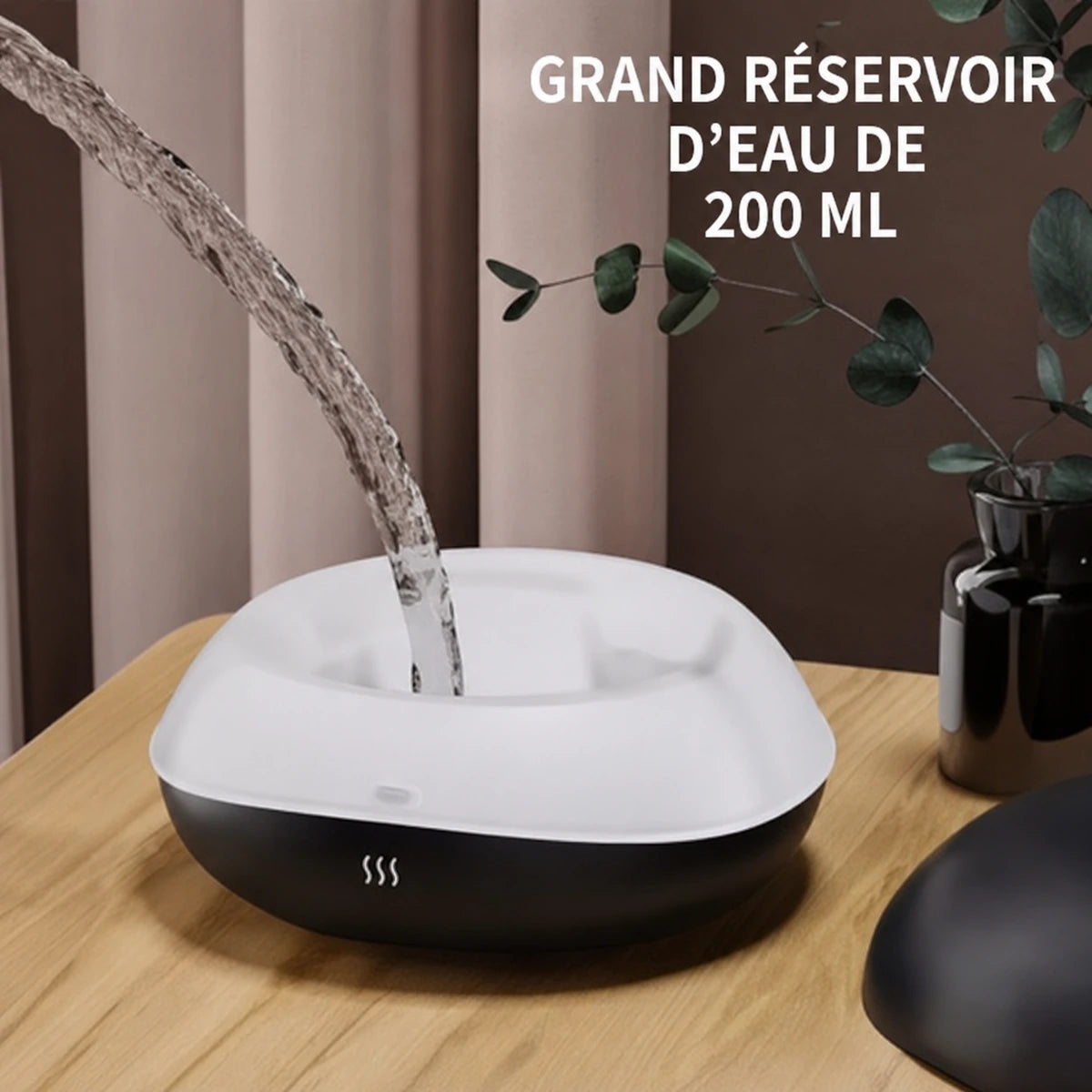 Remplissage du réservoir de 200 ml du diffuseur effet flamme